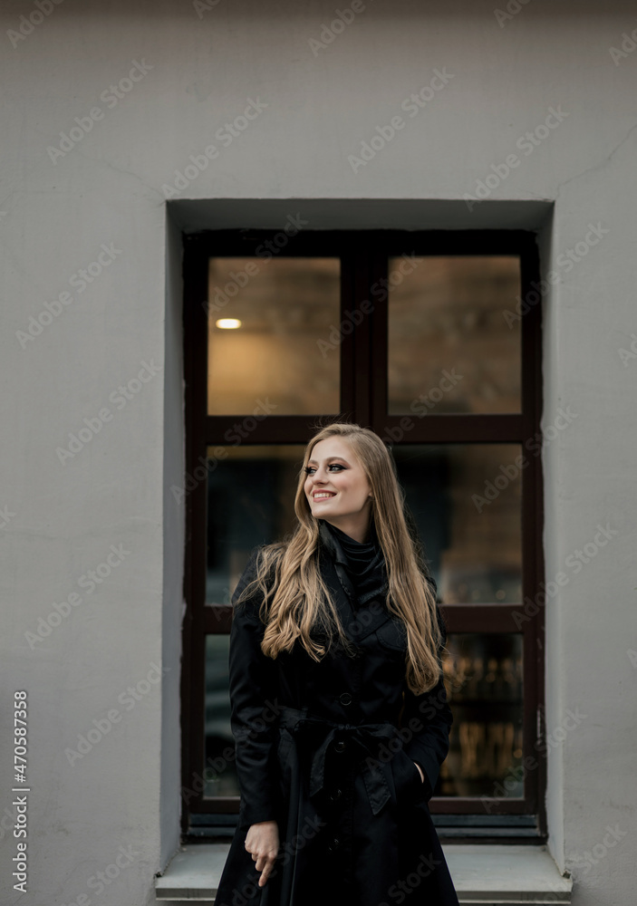 smiling woman wearing black coat smiling woman wearing black coat