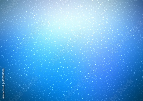 Fine snow falls on blue sky empty background. Winter texture simple pattern.