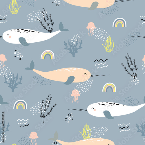 Narwhale, jellyfish and rainbow seamless childish pattern on blue grey background. Hand drawn repeat pattern for wrapping, fabrik, textile or paper projects. Vector illustration.