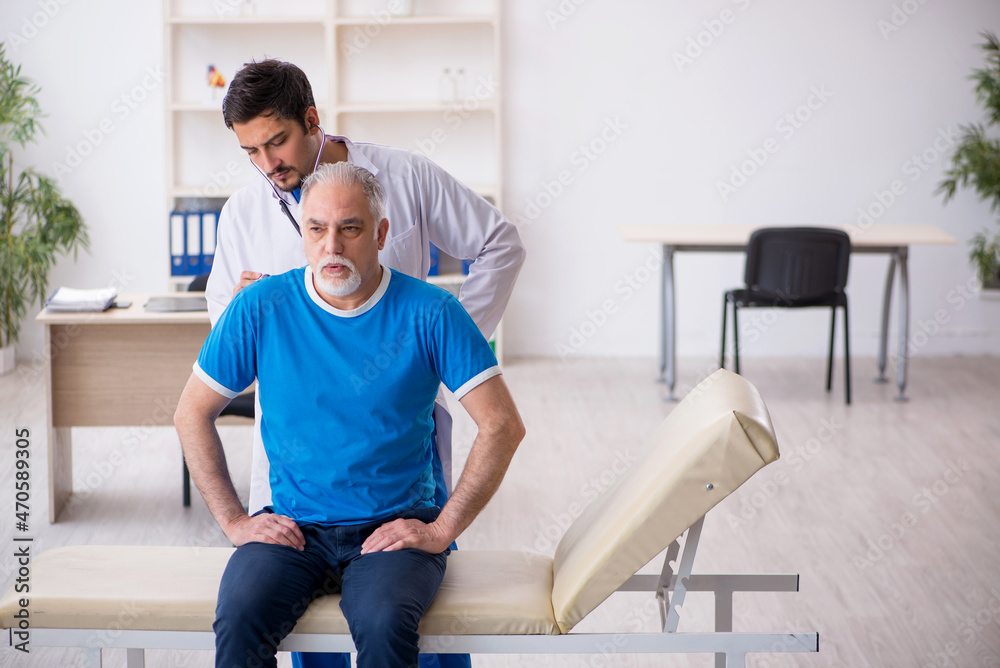 Old male patient visiting young male doctor
