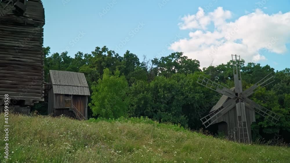 Wooden windmill in Ukrainian traditional village. Wooden windmill in Ukrainian traditional village.