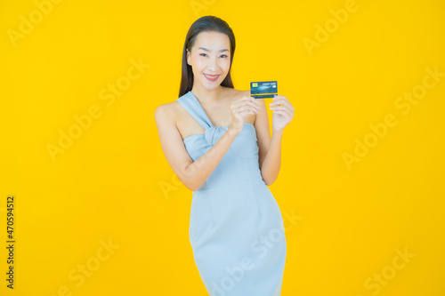 Portrait beautiful young asian woman smile with credit card