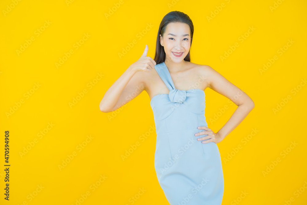 Portrait beautiful young asian woman smile with action Portrait beautiful young asian woman smile with action