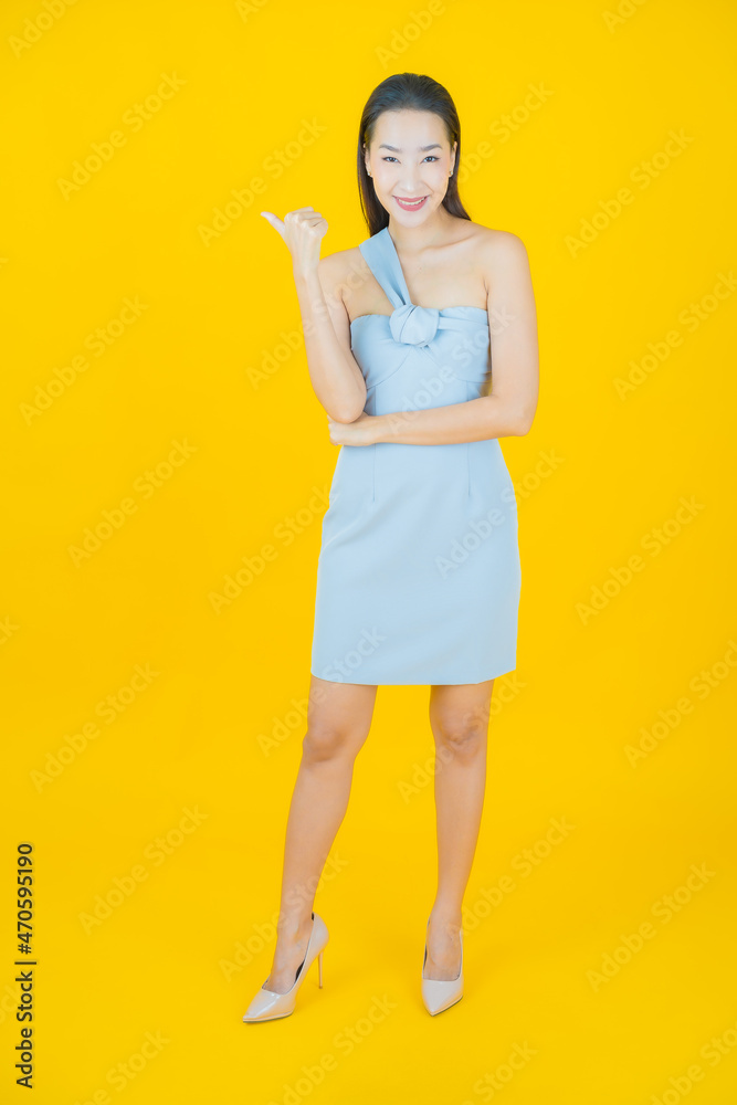 Portrait beautiful young asian woman smile with action Portrait beautiful young asian woman smile with action