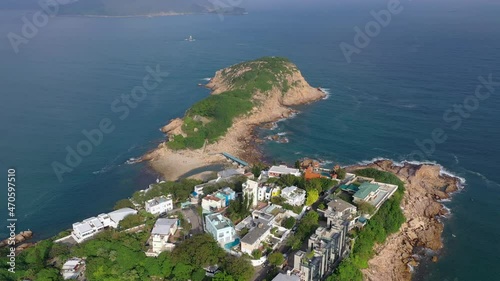 Drone fly over island and sea in Shek O of Hong Kong photo