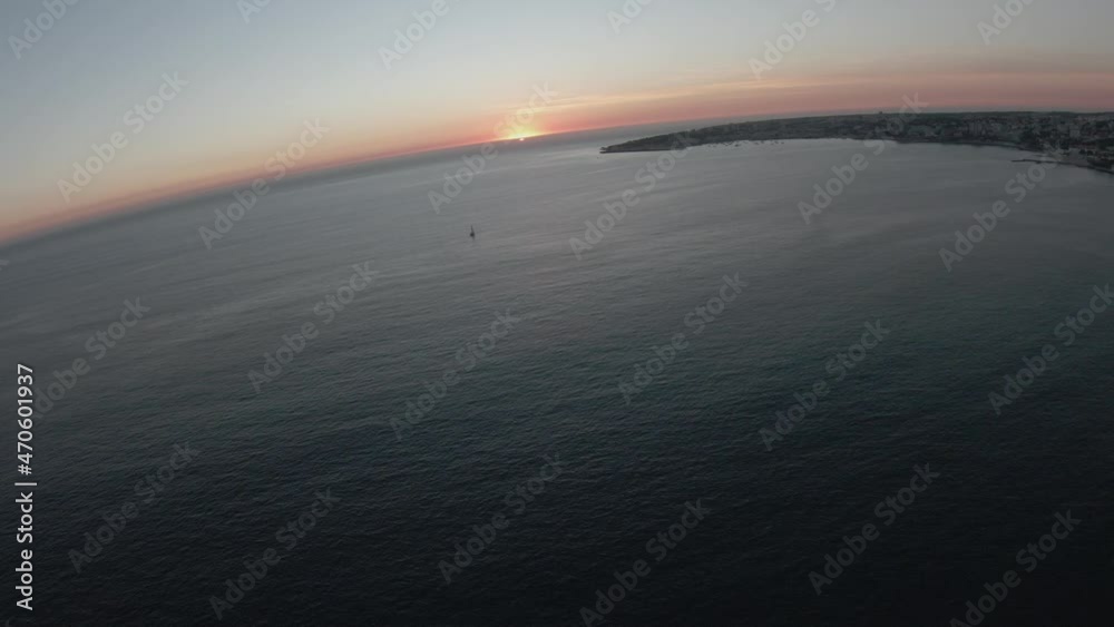 boat fishing into the night with amazing sunset boat fishing into the night with amazing sunset