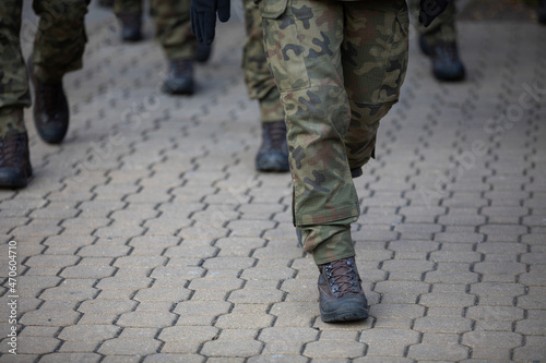 Polish soldiers march during a state holiday on the parade square.