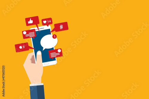 Social Media Smart Phone, Viral content, social media marketing and social media activity - likes, shares and comments popping up on the mobile screen	