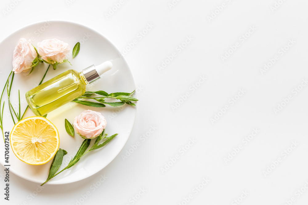 Herbal and fruite essential oil for beauty treatment. Top view Herbal and fruite essential oil for beauty treatment. Top view