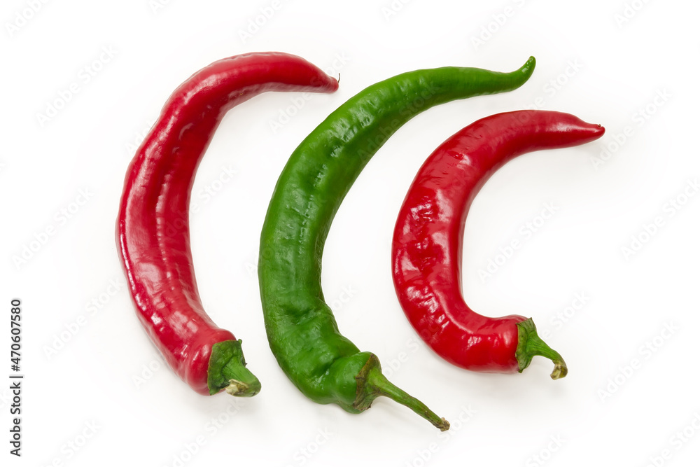 Red and green peppers chili on a white background
