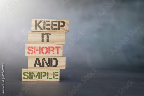 Wooden cubes with text KEEP IT SHORT AND SIMPLE