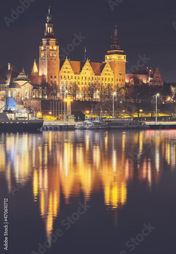 Szczecin waterfront with Chrobry Embankment at night, color toning applied, Poland.