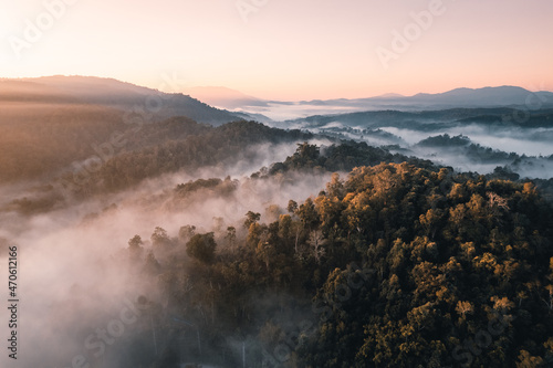 Flying above the clouds sunrise and fog