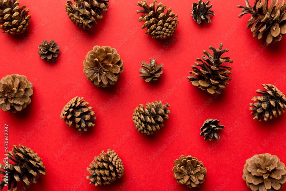 pine cones on colored table. natural holiday background with pinecones grouped together. Flat lay. Winter concept