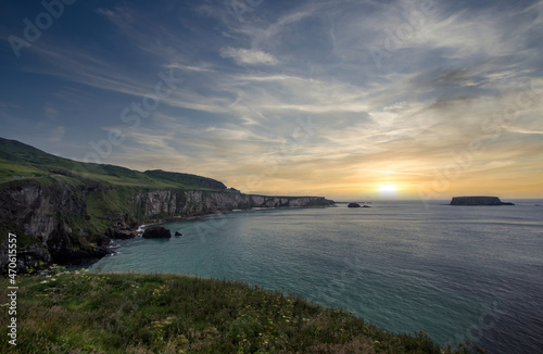 North Ireland Sea Coast Sunset, Atrim landscapes, North Ireland, Land of Myths and Legends Ireland, Cliffs and Rocks around Carrick-a-Rede Rope Bridge, North Ireland