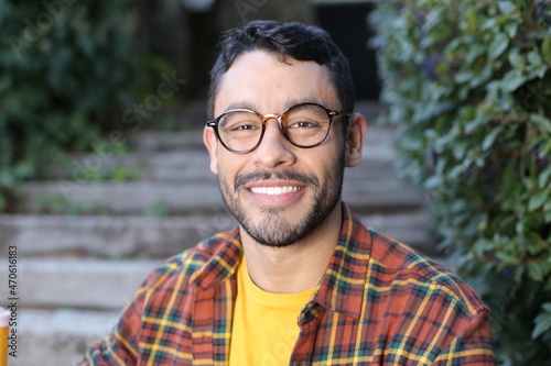 Handsome man with beautiful smile representing diversity photo