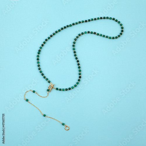 Women`s necklace of green malachite gem stones photo