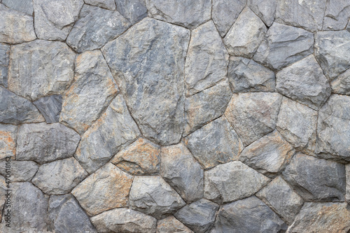 seamless rock wall background and texture. stone wall pattern.