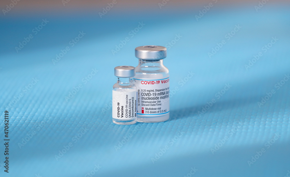 Vials of Vaccine for coronavirus cure, vaccine for Covid -19 pandemic and syringe