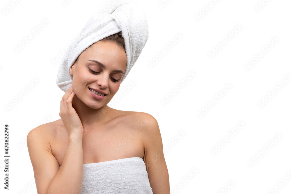 middle-aged woman with well-groomed velvet skin on her face enjoying relaxation after sauna middle-aged woman with well-groomed velvet skin on her face enjoying relaxation after sauna