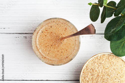 Billede på lærred Psyllium husk mixed with water and consumed to treat constipation