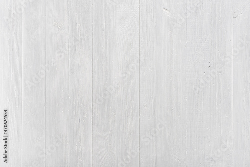 Clean white wooden texture background. Evenly painted wood pattern blank table top view flat lay.