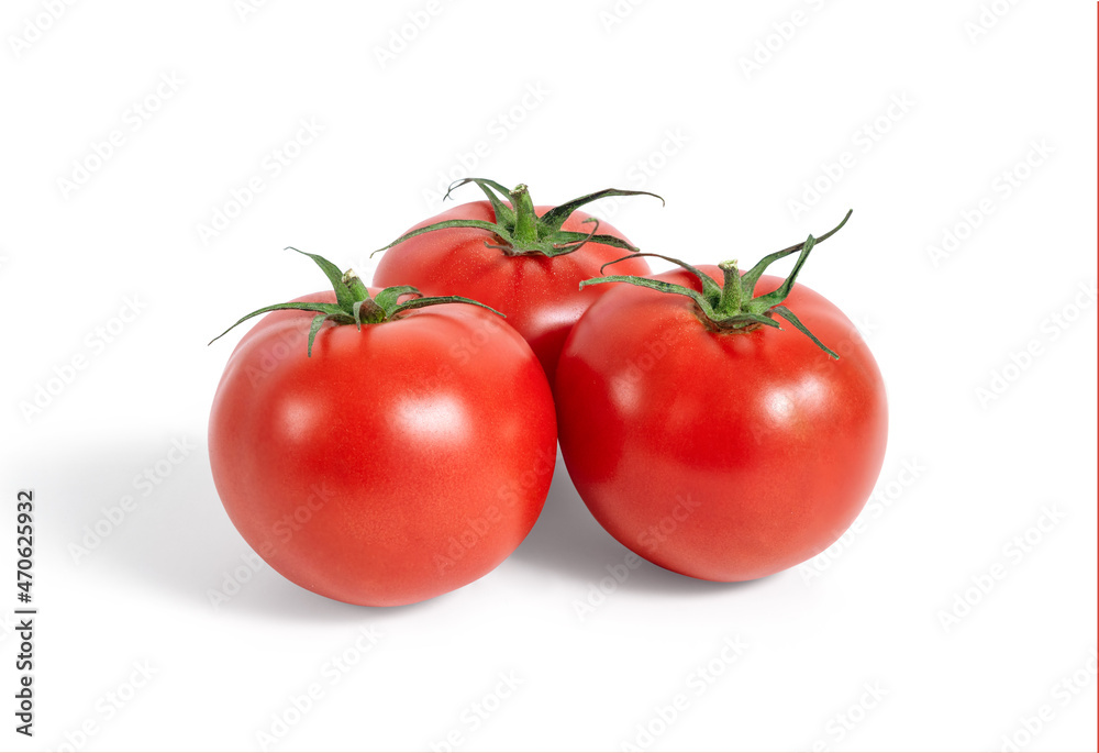 Three fresh tomatoes isolated from the background Three fresh tomatoes isolated from the background