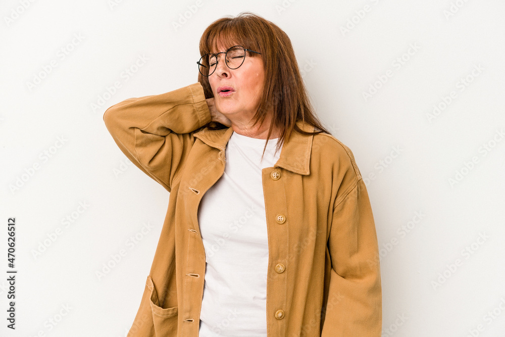 Middle age caucasian woman isolated on white background massaging elbow, suffering after a bad movement. Middle age caucasian woman isolated on white background massaging elbow, suffering after a bad movement.