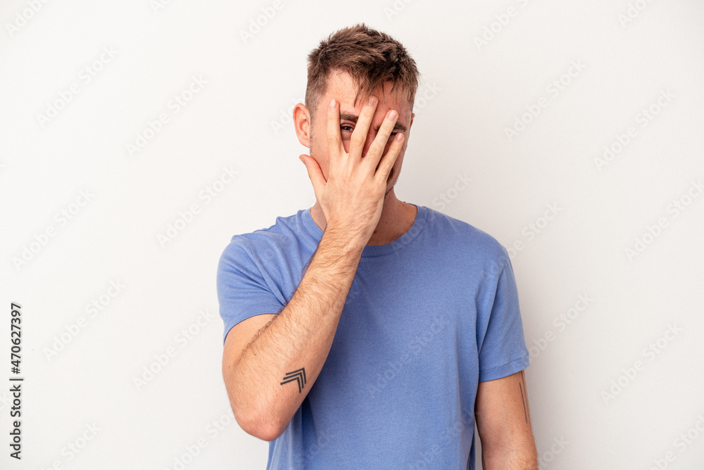 Young caucasian man isolated on pink background receiving a pleasant surprise, excited and raising hands. Young caucasian man isolated on pink background receiving a pleasant surprise, excited and raising hands.