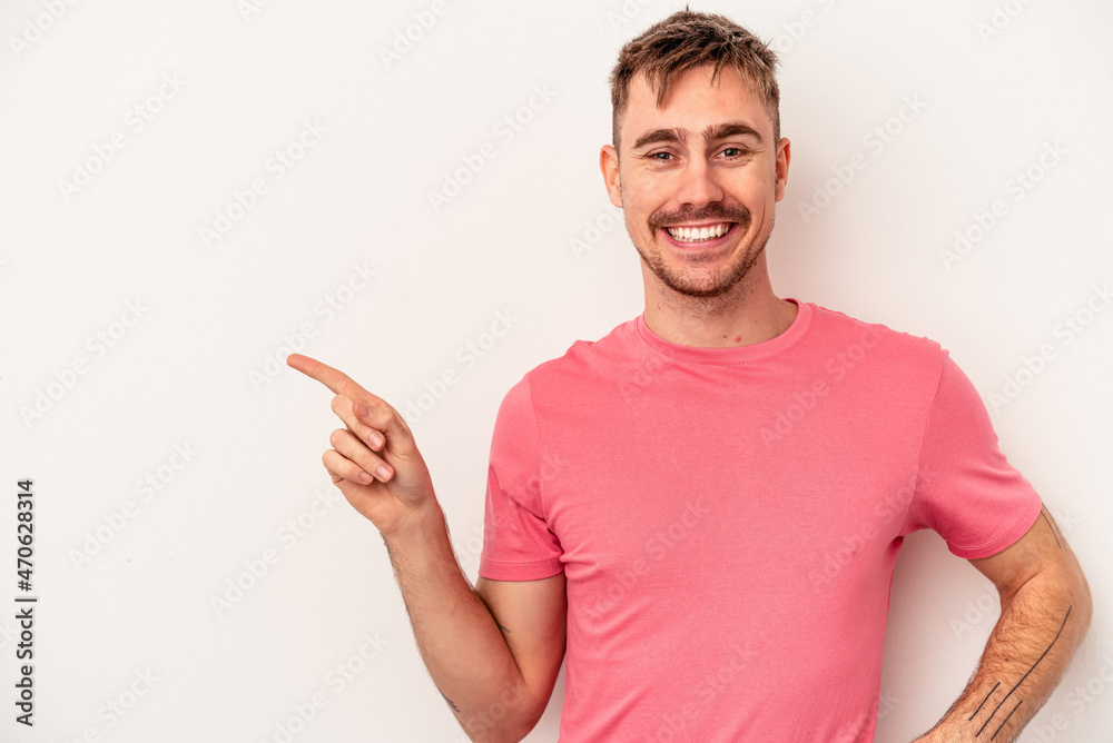 Young caucasian man isolated on white background praying, showing devotion, religious person looking for divine inspiration. Young caucasian man isolated on white background praying, showing devotion, religious person looking for divine inspiration.