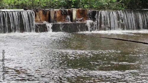 It is beautiful to see the excess water of the lake coming out photo