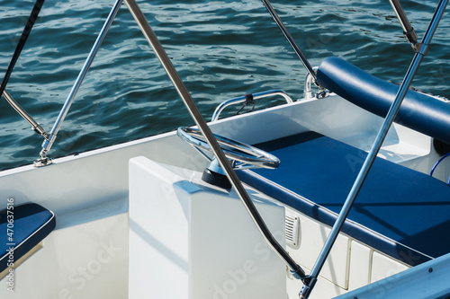 Foto Motorboat on a lake background