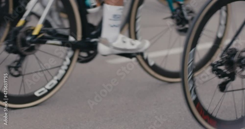 Cyclists bike riders cycles pro tour road racing sport event close up