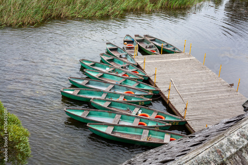 Green boats on Kaneru lake photo