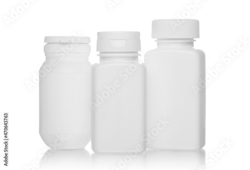 White medical bottles, isolated on white background