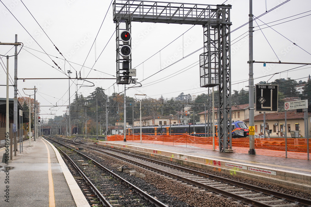 Fototapeta premium Traffic lights and power poles at the station