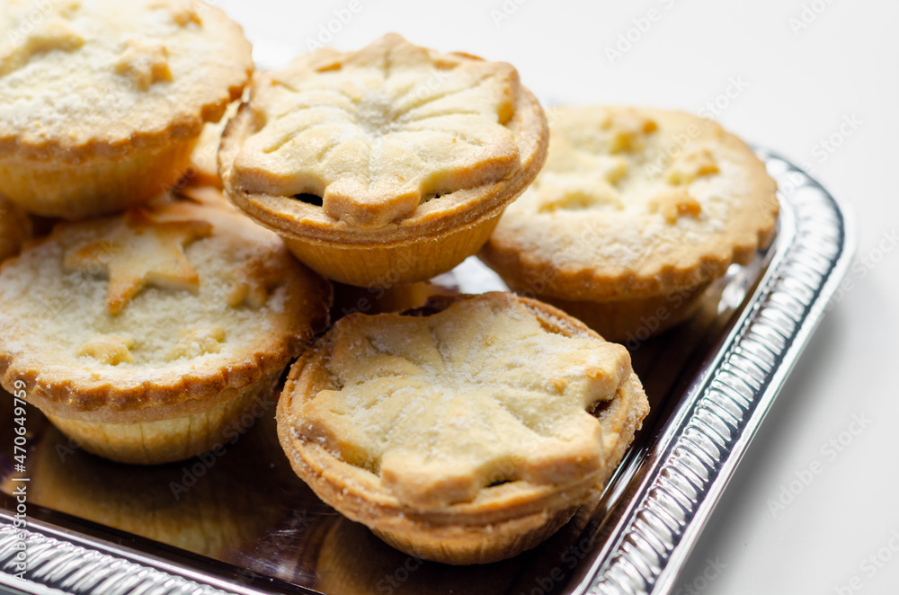 All-butter pastry pies with a mincemeat filling with spiced vine fruits, Christmas cookies