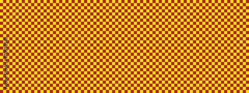 Checkerboard banner. Firebrick and Yellow colors of checkerboard. Small squares, small cells. Chessboard, checkerboard texture. Squares pattern. Background.