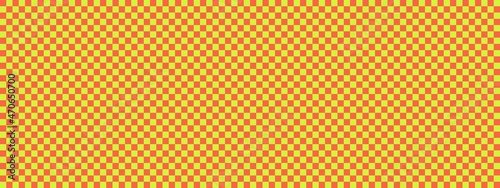 Checkerboard banner. Lime and Tomato colors of checkerboard. Small squares, small cells. Chessboard, checkerboard texture. Squares pattern. Background.