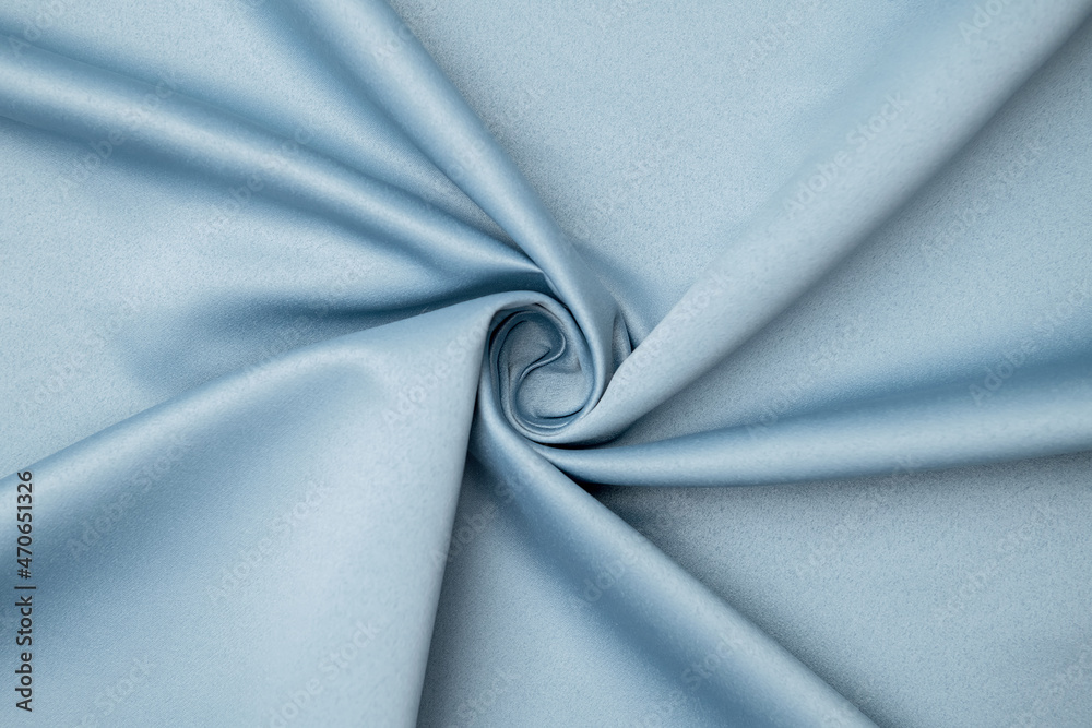 Background, texture. Template. Satin cloth for wedding and evening dresses. A nude shade.