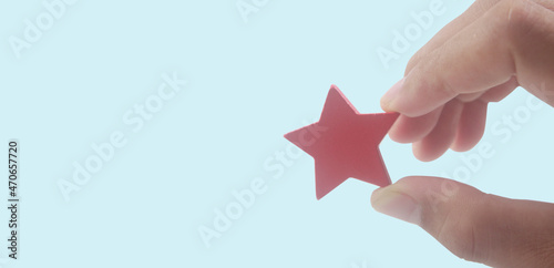 Rise on increasing stars in human hand, Increase rating