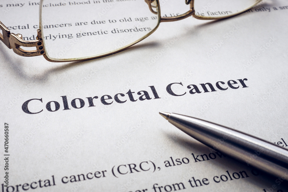 Info about colorectal cancer and pen with glasses. Info about colorectal cancer and pen with glasses.