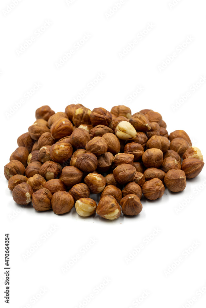Hazelnut kernel isolated on white background. Snack fresh Peeled hazelnuts. close up. Story format Hazelnut kernel isolated on white background. Snack fresh Peeled hazelnuts. close up. Story format