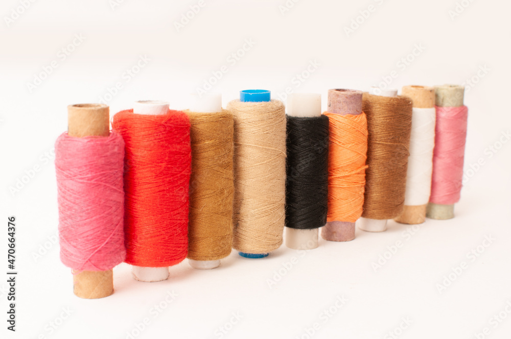 Threads of Warm shades on a white background. Threads of Warm shades on a white background.