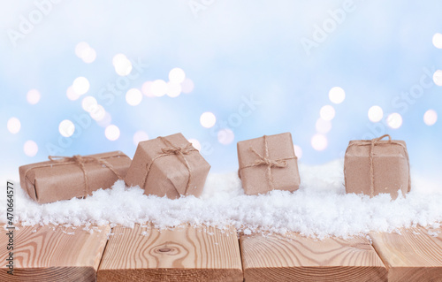 christmas background with presents in the snow