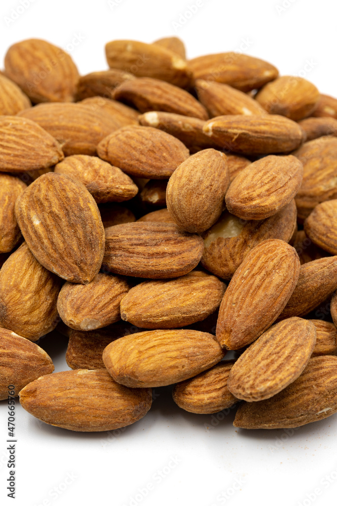 Almond isolated on white background. Snack fresh nuts. close up. Story format Almond isolated on white background. Snack fresh nuts. close up. Story format
