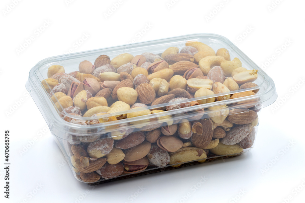 Packed Mixed nuts isolated on white background. Snack nuts. close-up. Packed Mixed nuts isolated on white background. Snack nuts. close-up.
