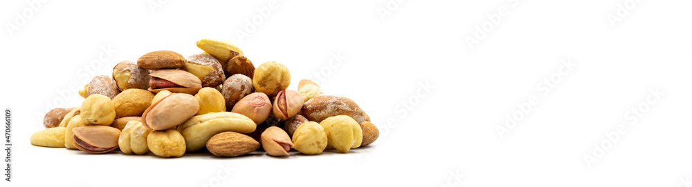 Mixed nuts isolated on white background. Snack fresh nuts. close up. Empty space for text. Copy space Mixed nuts isolated on white background. Snack fresh nuts. close up. Empty space for text. Copy space