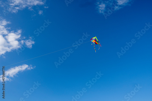 Colorful kites flying in the blue sky