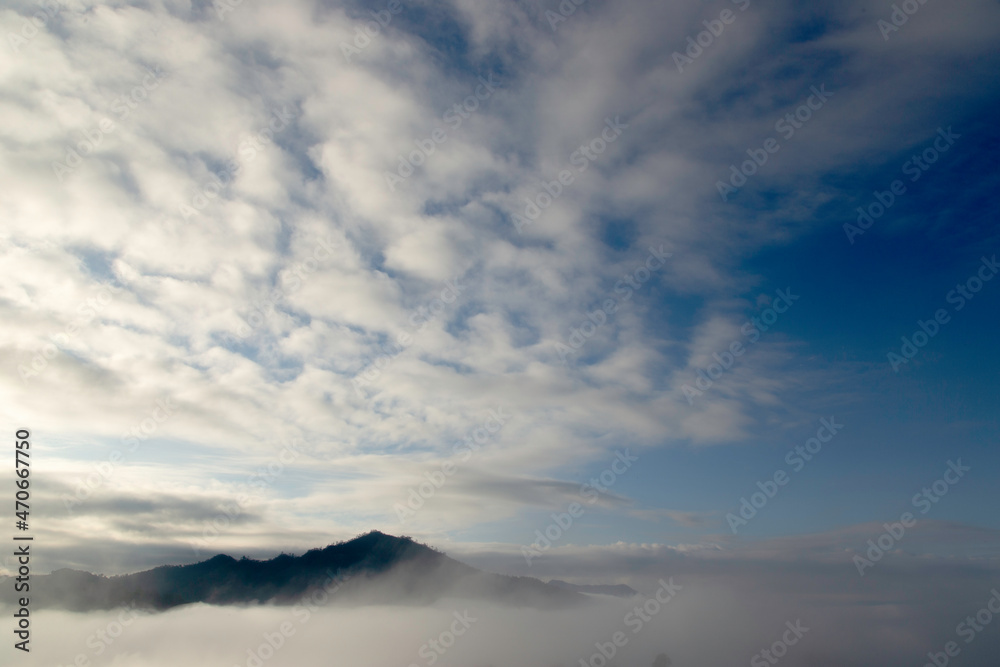 The humidity in the air floated into a mist over the mountains in the morning, looking beautiful. The humidity in the air floated into a mist over the mountains in the morning, looking beautiful.